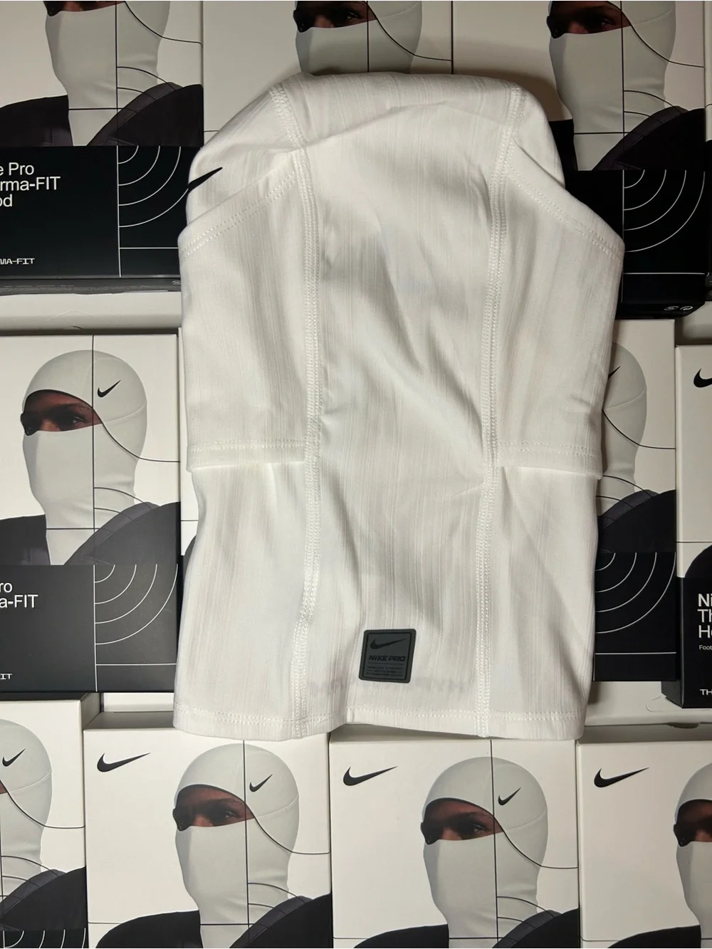 Nike White Performance Training Top with Black Logo Badge